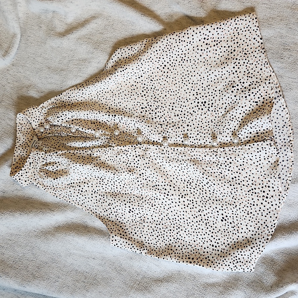 Womens sizw small blouse with pearl buttons. Express